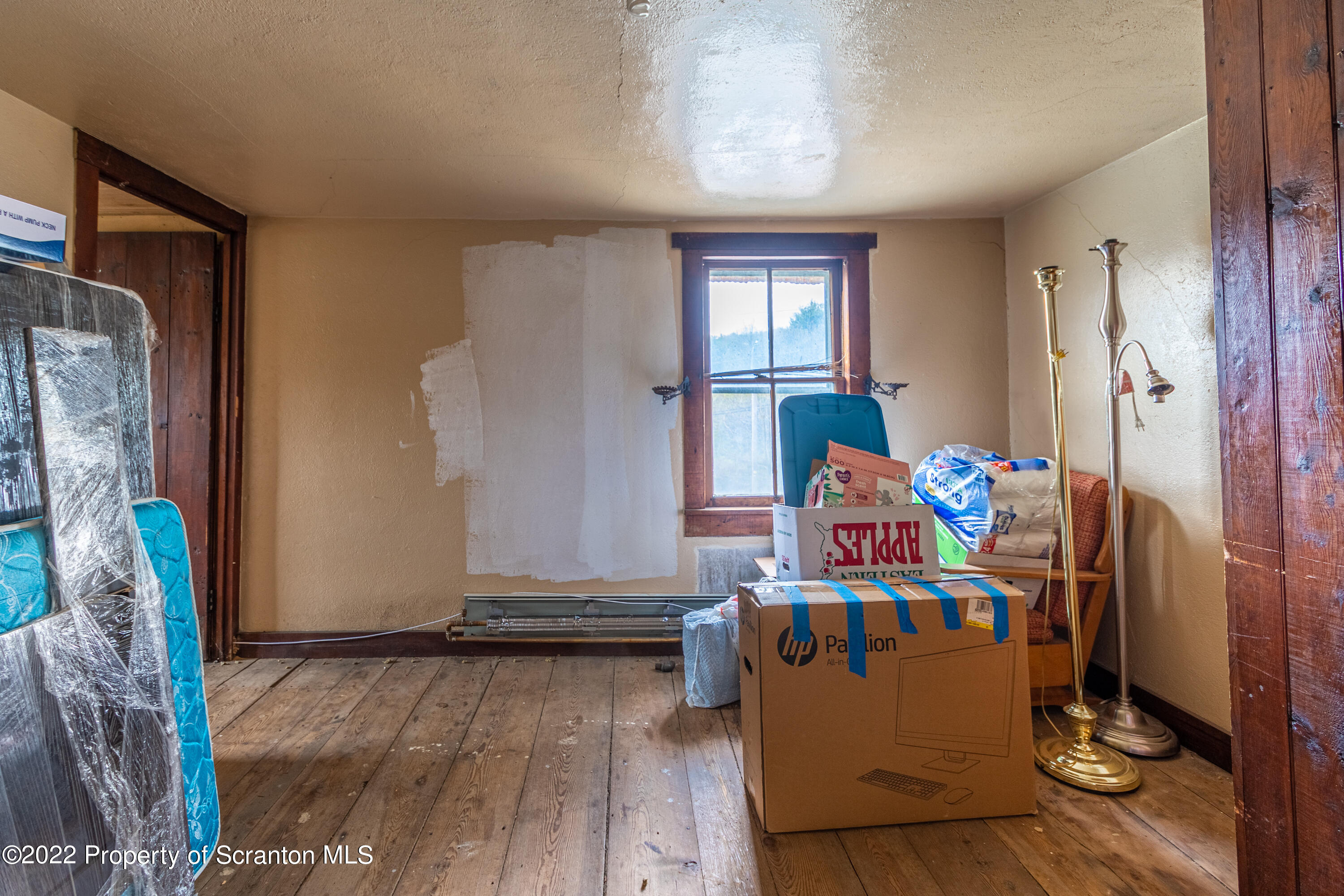 184 Crescent Lake Road Scotrun, PA 18355 - Photo 33 of 38 a living room with furniture and a window