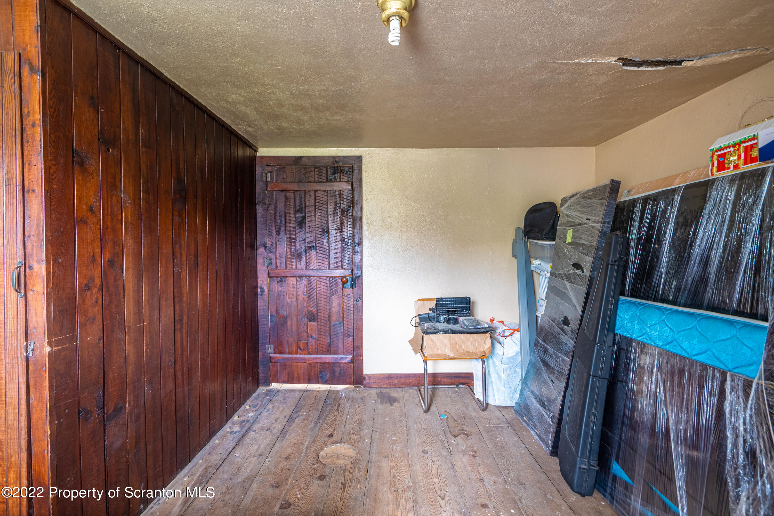 184 Crescent Lake Road Scotrun, PA 18355 - Photo 34 of 38 a view of a livingroom with wooden furniture