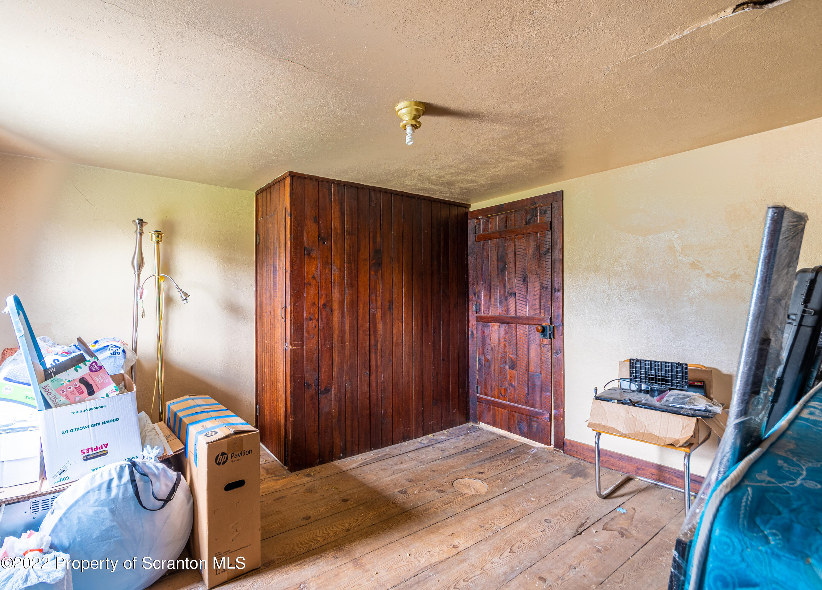 184 Crescent Lake Road Scotrun, PA 18355 - Photo 35 of 38 a bedroom with a bed and a window