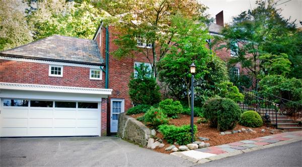 16 Gate House Road Newton, MA 02467 - Photo 1 of 20 a front view of a house with a garden