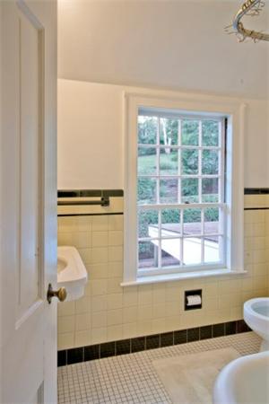 16 Gate House Road Newton, MA 02467 - Photo 12 of 20 a bathroom with a window and a shower