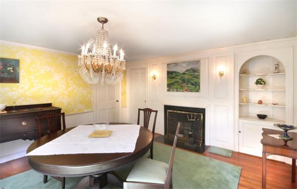 16 Gate House Road Newton, MA 02467 - Photo 8 of 20 a view of a dining room with furniture and chandelier
