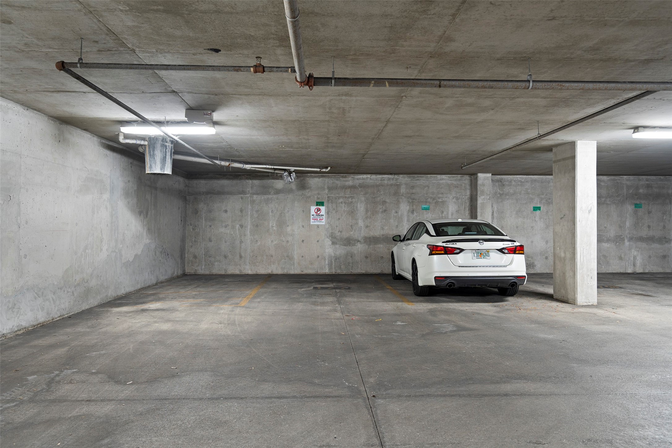 1900 Barton Springs Road, Unit 5027 Austin, TX 78704 - Photo 17 of 28 Center spot and area to the left is our second parking area. Able to park 3 cars total. RARE!