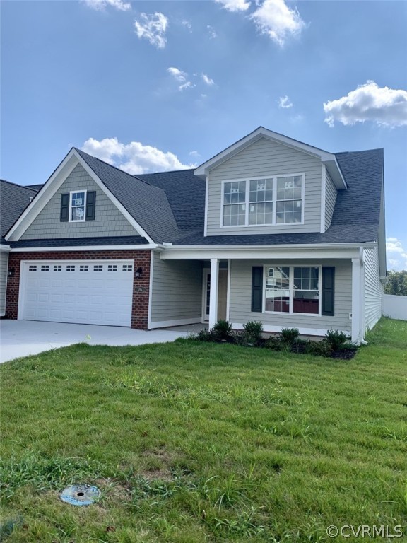 76 Wendenburg Way Aylett, VA 23009 - Photo 2 of 23 a view of a house with a garden