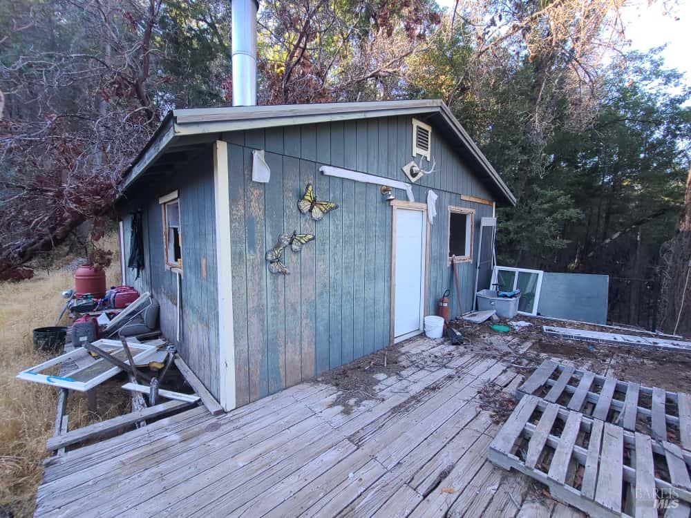 28990 Eel River Ranch Road Covelo, CA 95428 - Photo 12 of 31 a front view of a house with a yard