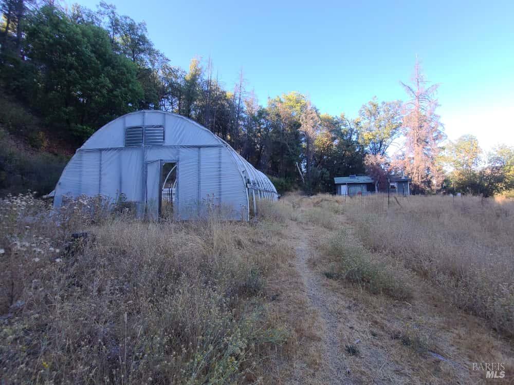 28990 Eel River Ranch Road Covelo, CA 95428 - Photo 21 of 31 a view of backyard of house