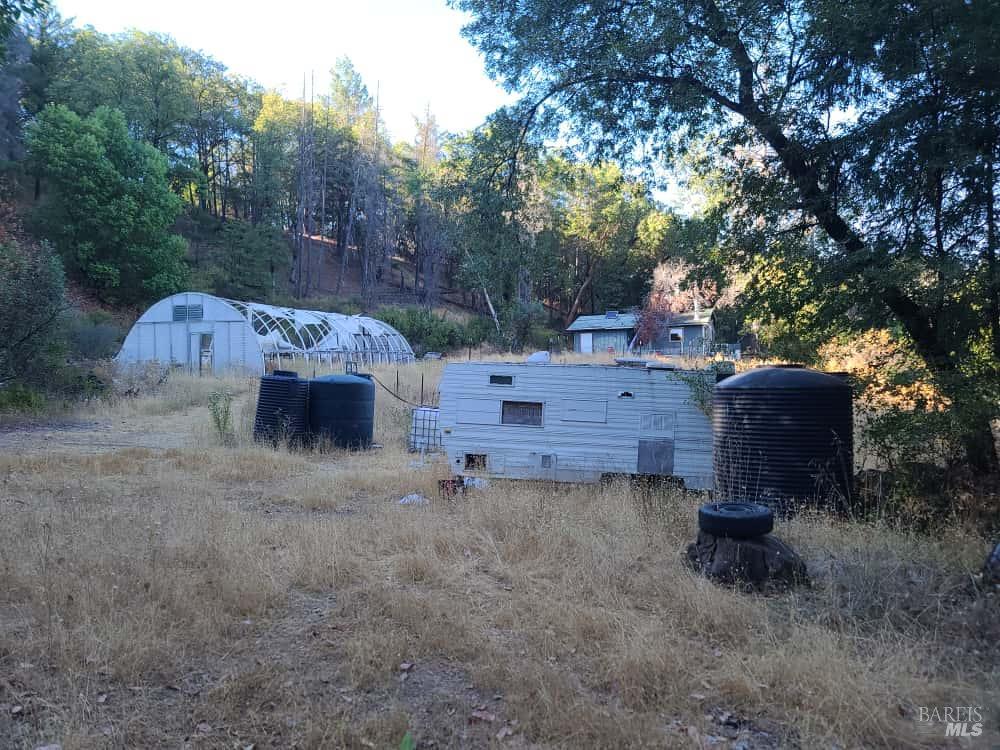 28990 Eel River Ranch Road Covelo, CA 95428 - Photo 28 of 31 a view of a table and chair in the room