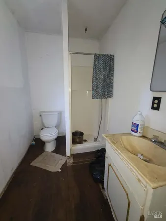 a bathroom with a sink toilet and vanity