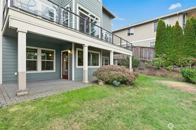 front view of a house with a big yard
