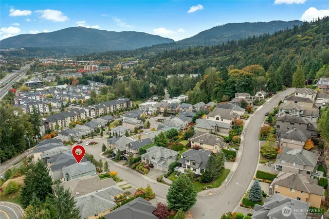 an aerial view of residential house with an outdoor space