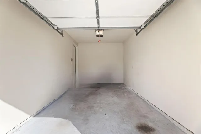 a view of a pathway both side of house