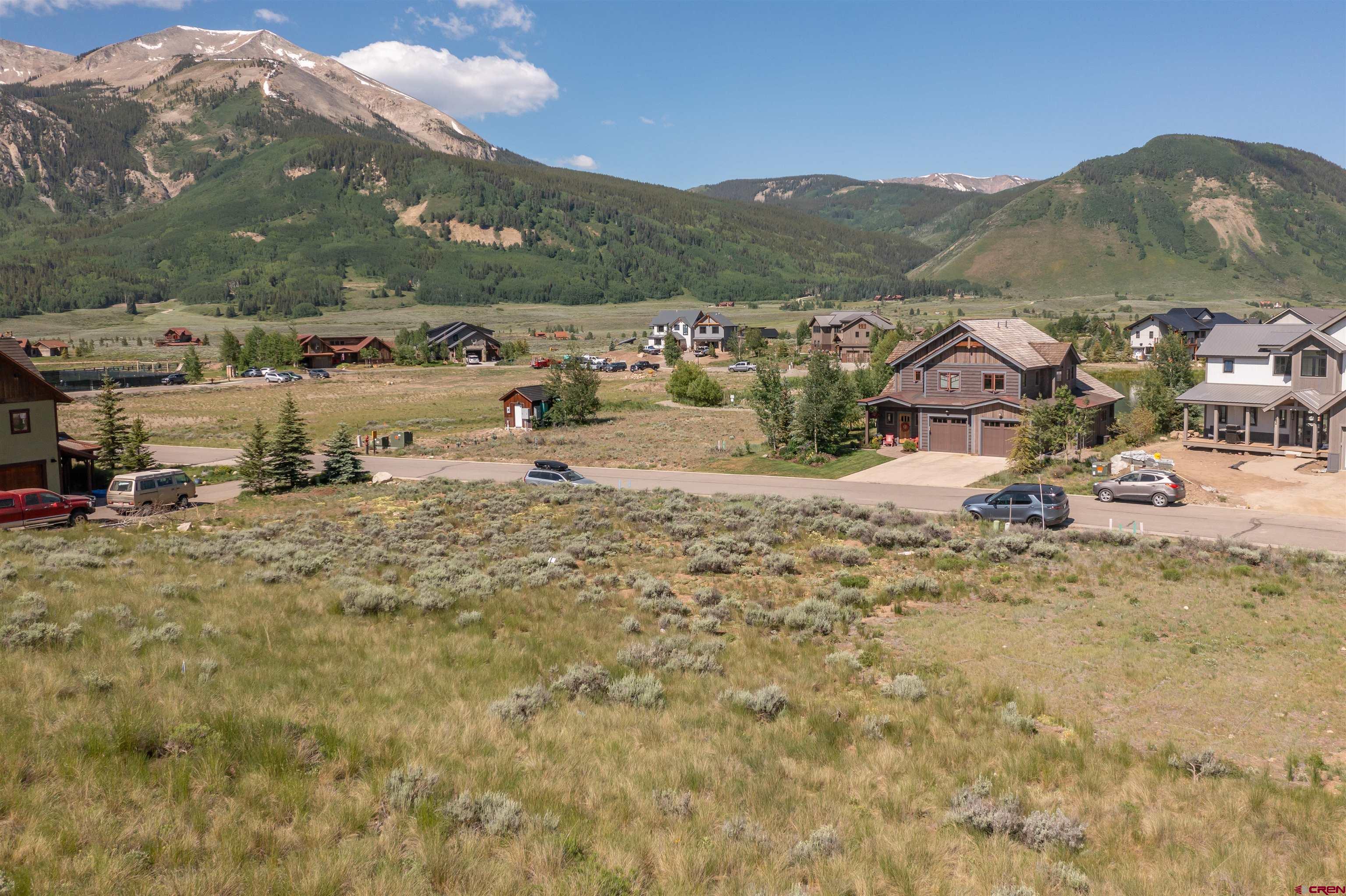 365 Larkspur Loop Crested Butte, CO 81224 - Photo 13 of 20 a view of a town with mountains in the background