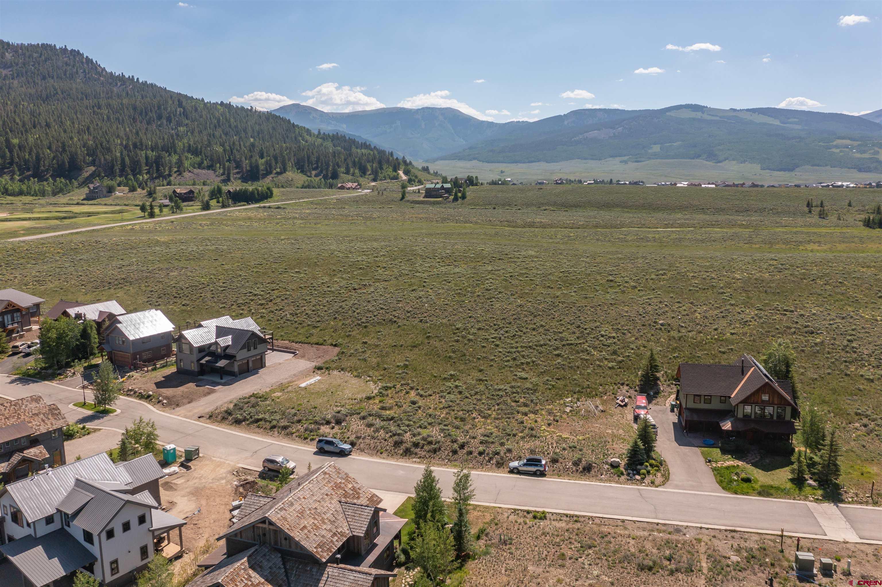 365 Larkspur Loop Crested Butte, CO 81224 - Photo 16 of 20 a view of a lake with a mountain