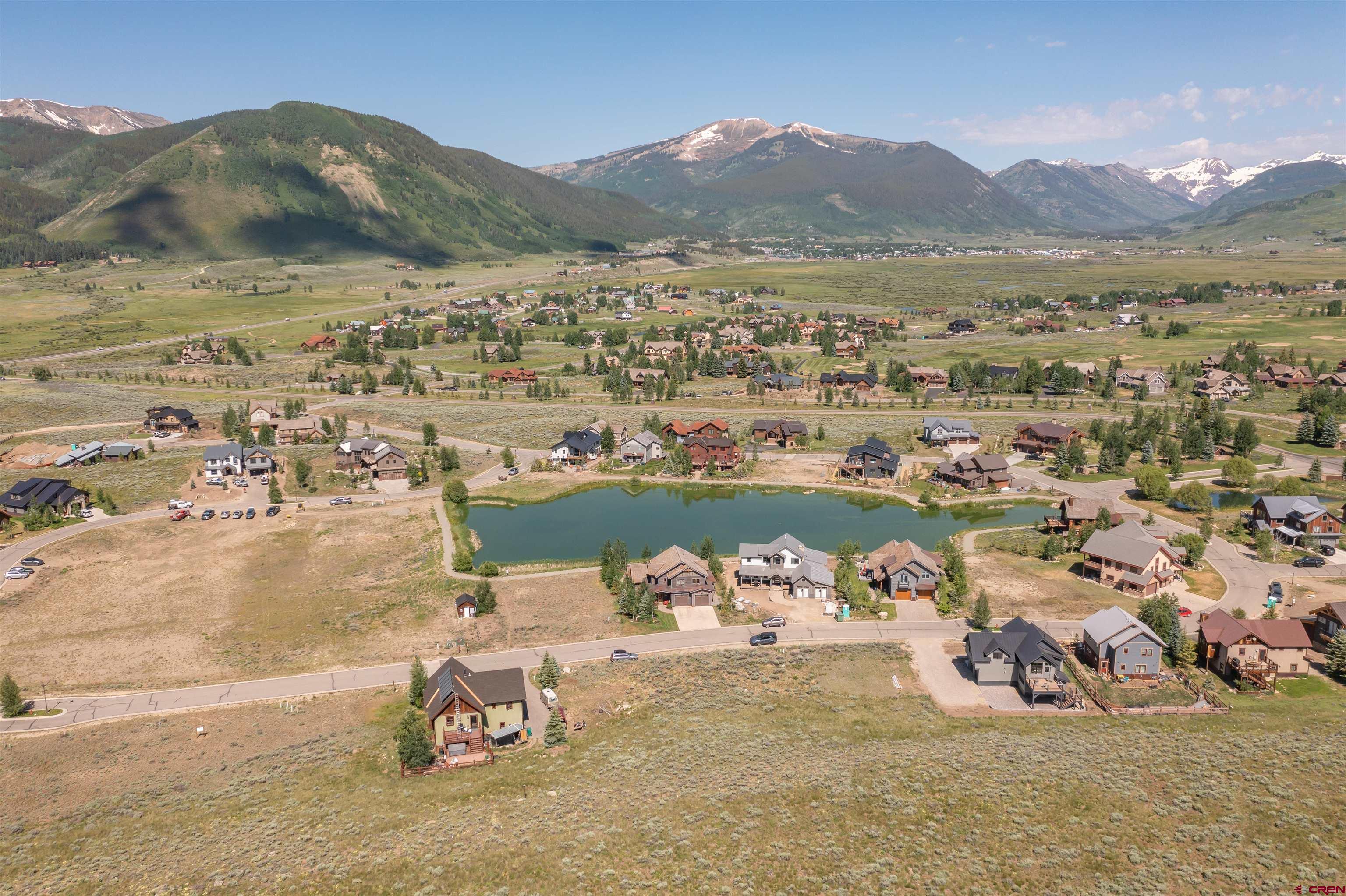365 Larkspur Loop Crested Butte, CO 81224 - Photo 20 of 20 an aerial view of a house with a lake view