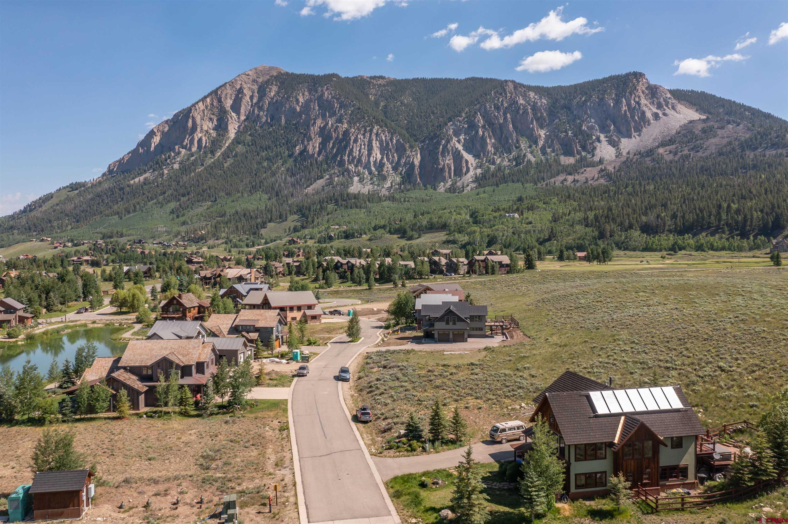 365 Larkspur Loop Crested Butte, CO 81224 - Photo 8 of 20 a view of a lake in middle of the town