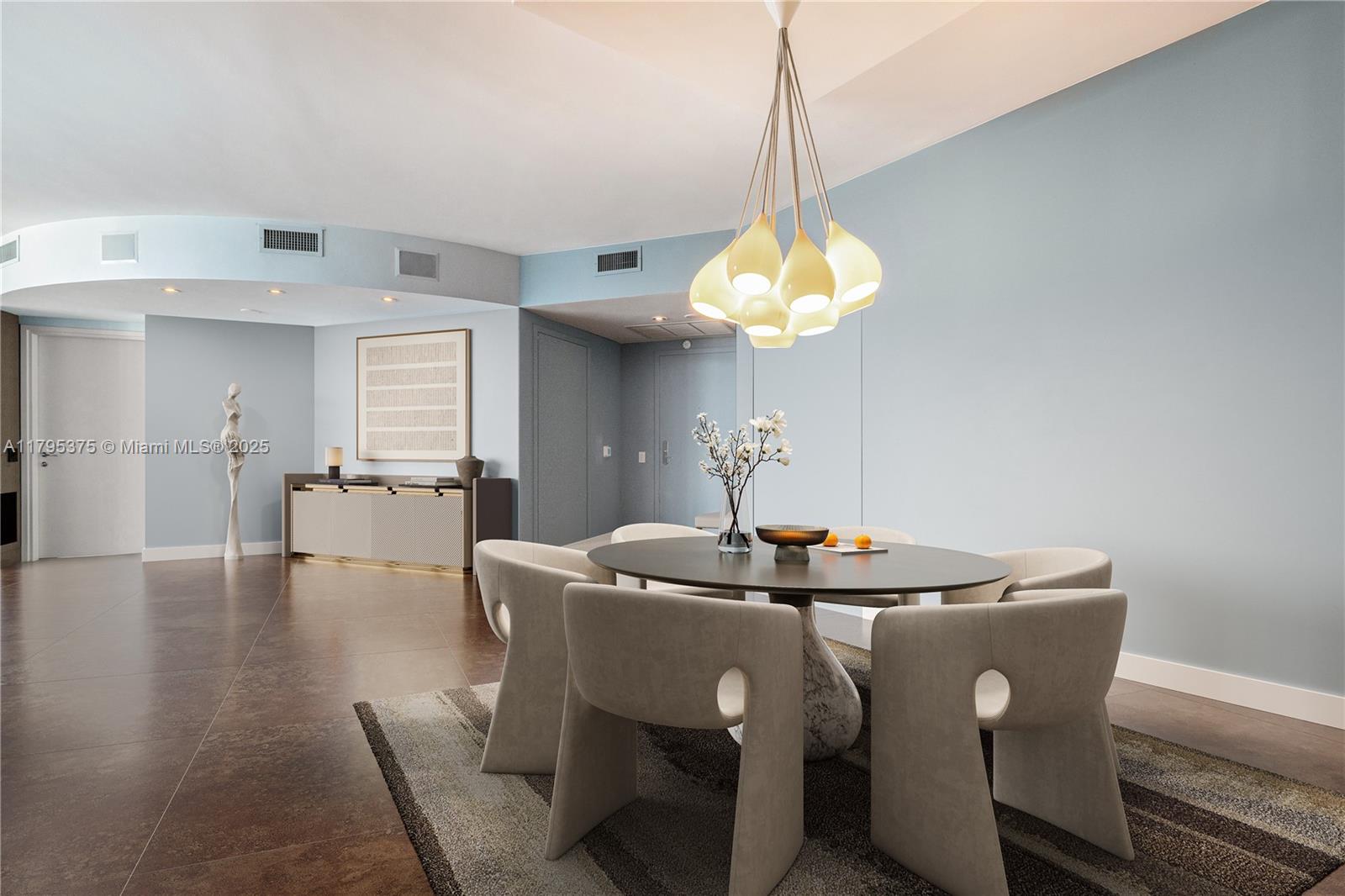 450 Alton Road, Unit 2303 Miami Beach, FL 33139 - Photo 15 of 51 a dining room with furniture and chandelier