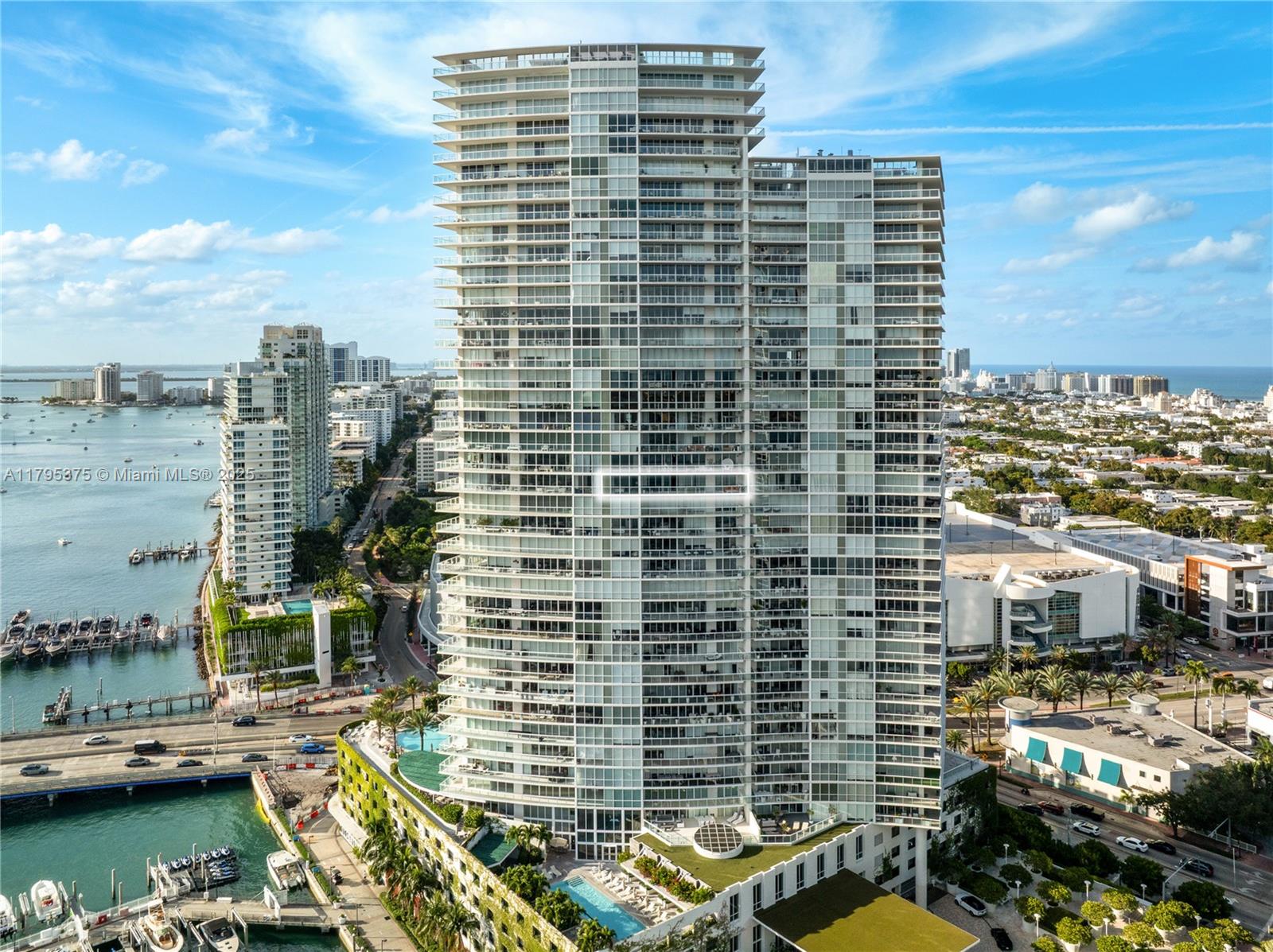 450 Alton Road, Unit 2303 Miami Beach, FL 33139 - Photo 25 of 51 a view of a city with tall buildings