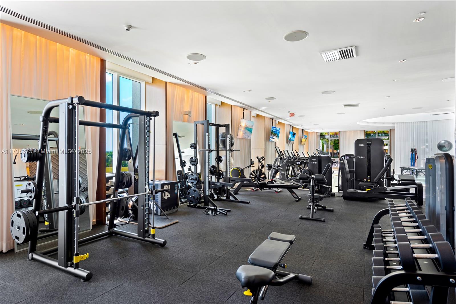 450 Alton Road, Unit 2303 Miami Beach, FL 33139 - Photo 40 of 51 a view of a room with gym equipment