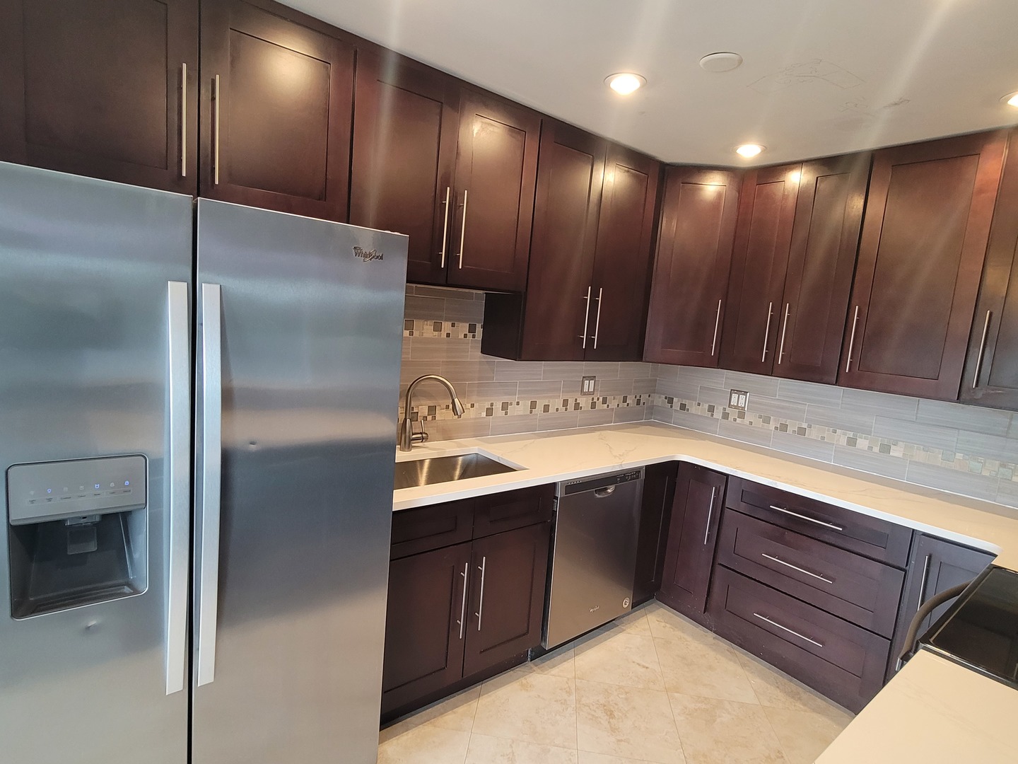 725 West Huntington Commons Road, Unit 208 Mount Prospect, IL 60056 - Photo 7 of 21 a view of kitchen with stainless steel appliances granite countertop cabinets and sink