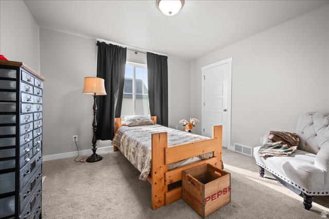 3359 Eurasian Crane Road Clinton, UT 84015 - Photo 30 of 71 Bedroom with baseboards and carpet floors