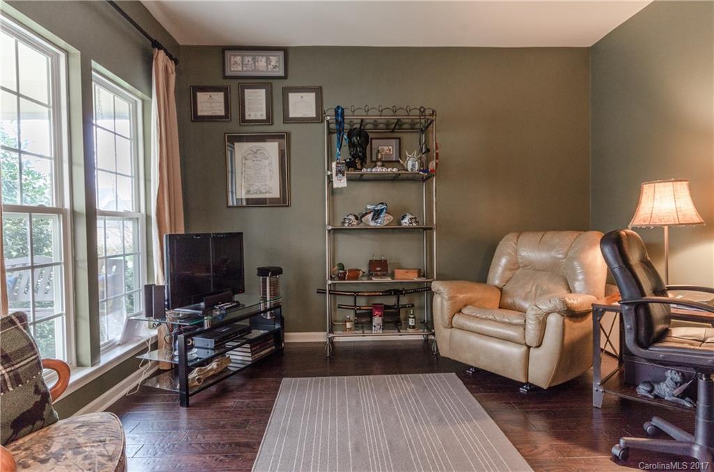 7191 Meyer Road Fort Mill, SC 29715 - Photo 4 of 24 a living room with furniture a rug and a large window