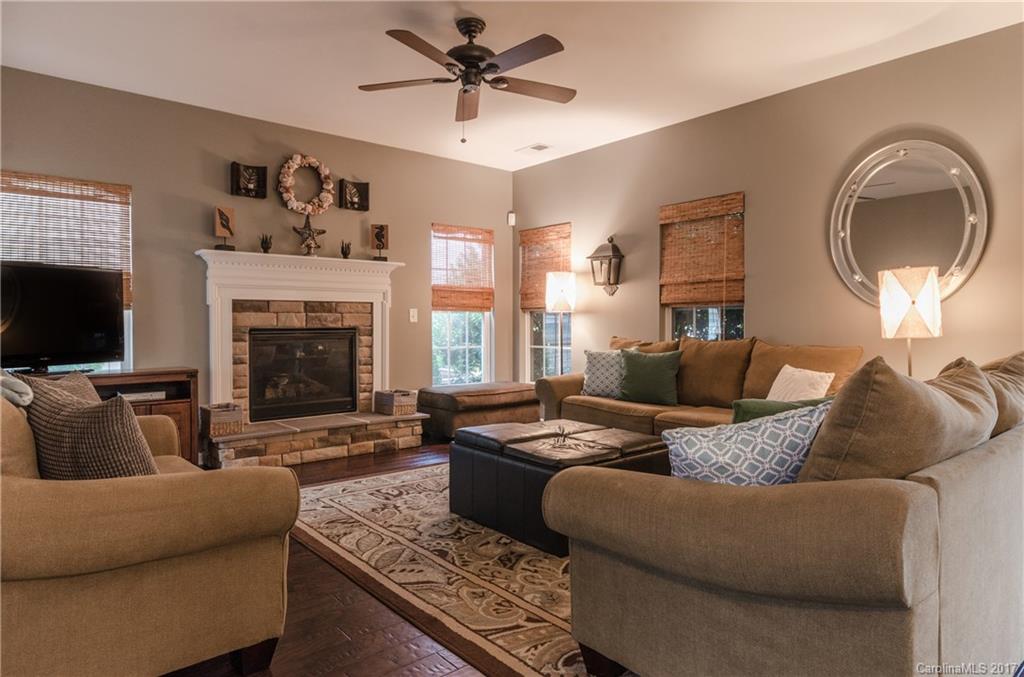 7191 Meyer Road Fort Mill, SC 29715 - Photo 5 of 24 a living room with furniture and a fireplace
