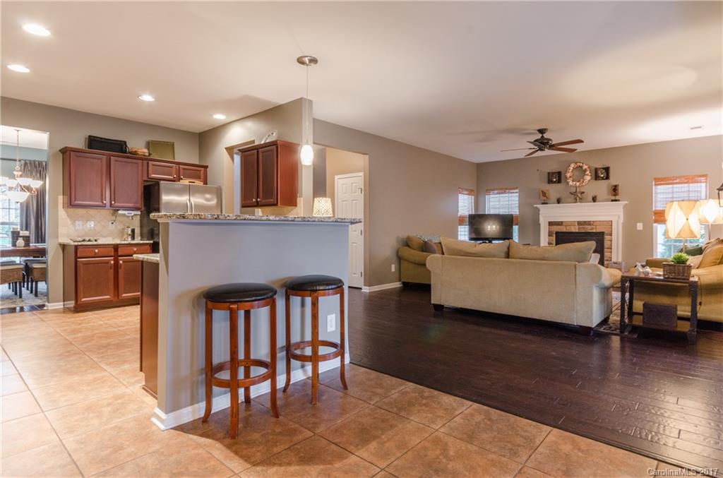 7191 Meyer Road Fort Mill, SC 29715 - Photo 7 of 24 a living room with furniture and kitchen view