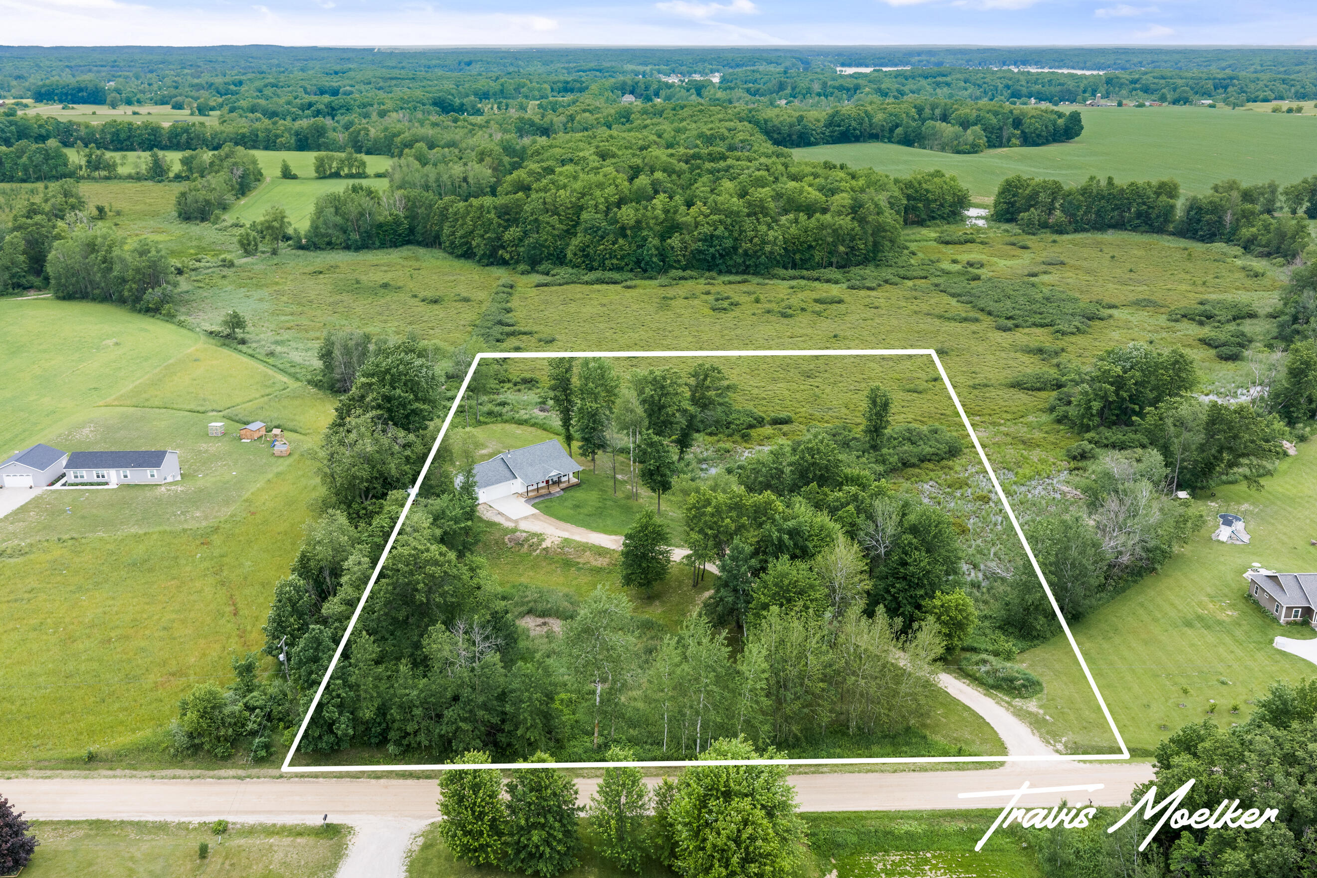 23438 Kimball Road Sand Lake, MI 49343 - Photo 3 of 43 DJI_20260617122117_0001_D-Edit