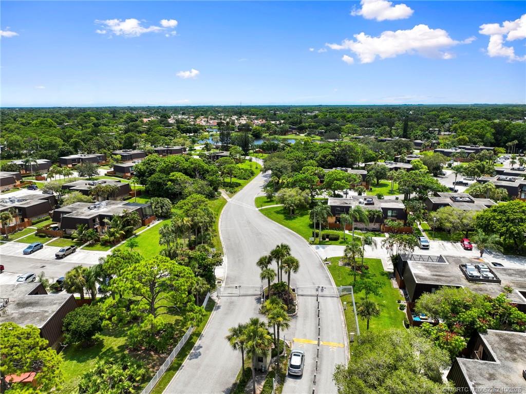 5818 Southeast Windsong Lane Stuart, FL 34997 - Photo 11 of 18 an aerial view of a city