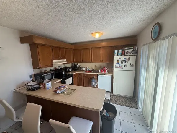 $220,000 | 5818 Southeast Windsong Lane, Stuart, FL 34997