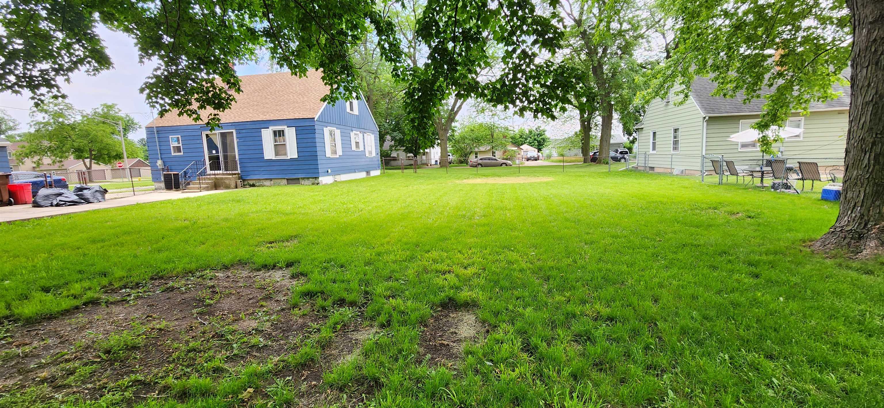 532 Anna Avenue Loves Park, IL 61115 - Photo 4 of 5 a view of house with yard and green space