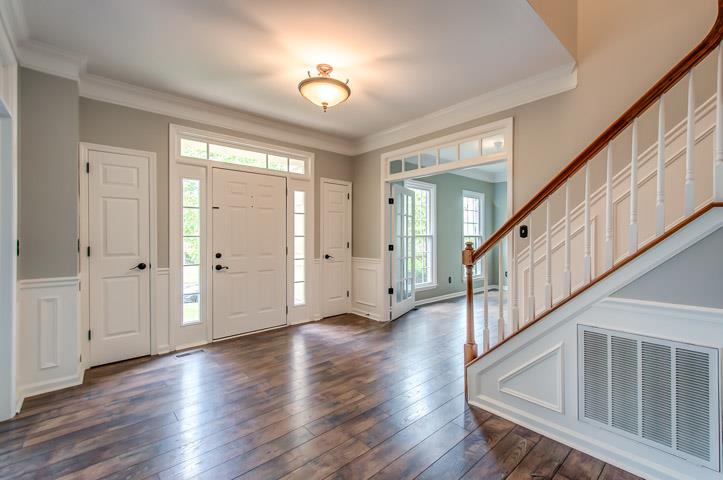 109 Chester Stevens Road Franklin, TN 37067 - Photo 3 of 30 a view of an entryway with wooden floor and windows
