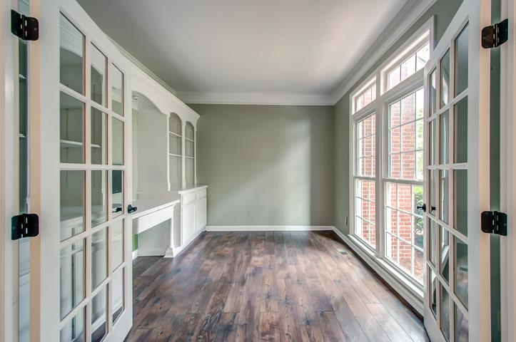 109 Chester Stevens Road Franklin, TN 37067 - Photo 5 of 30 wooden floor in an empty room with a window
