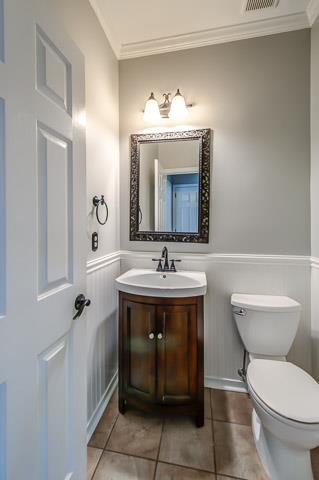 109 Chester Stevens Road Franklin, TN 37067 - Photo 8 of 30 a bathroom with a toilet sink and mirror