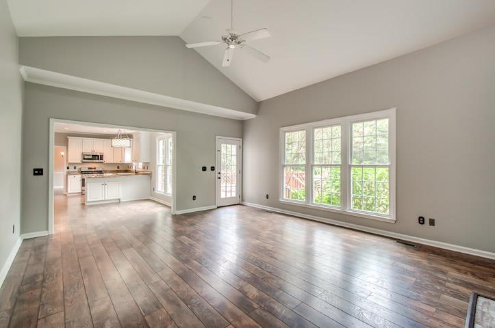 109 Chester Stevens Road Franklin, TN 37067 - Photo 10 of 30 a view of an empty room with a window and wooden floor