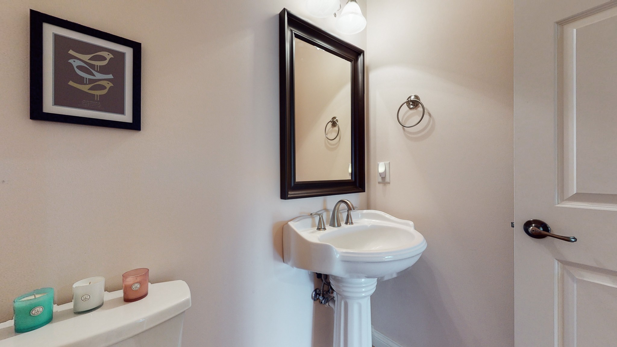 665 Springlake Drive Franklin, TN 37064 - Photo 19 of 41 a bathroom with a sink and mirror