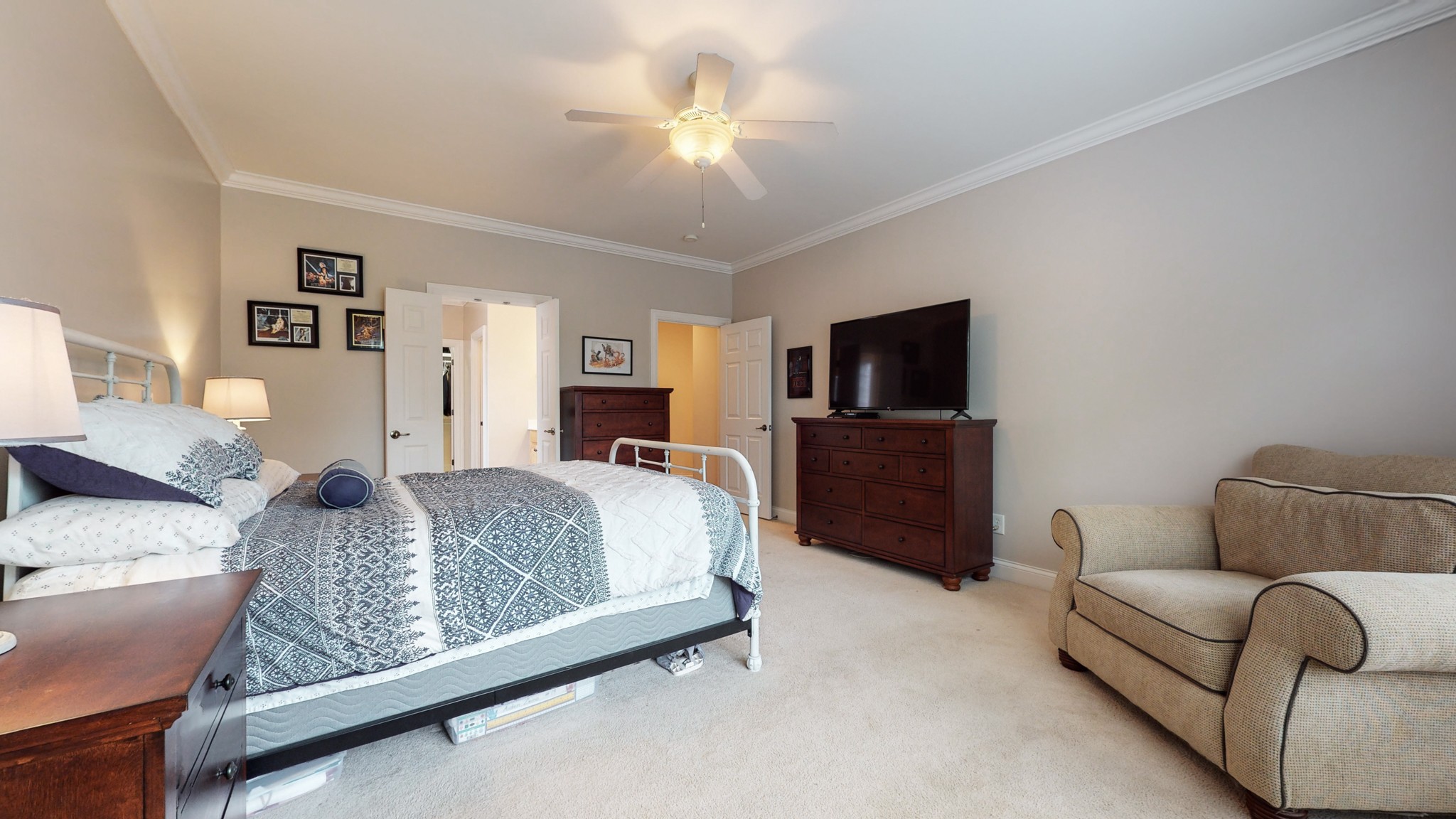 665 Springlake Drive Franklin, TN 37064 - Photo 22 of 41 a living room with furniture and a flat screen tv