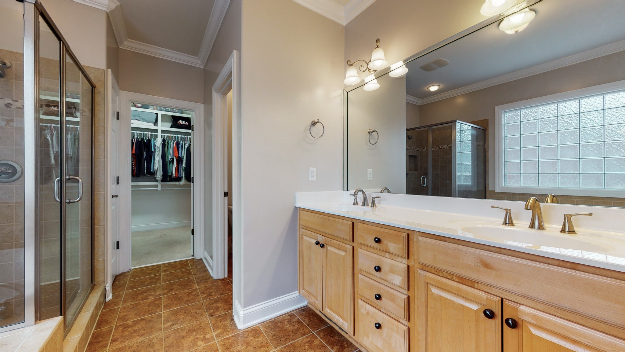665 Springlake Drive Franklin, TN 37064 - Photo 24 of 41 a bathroom with a double vanity sink and mirror