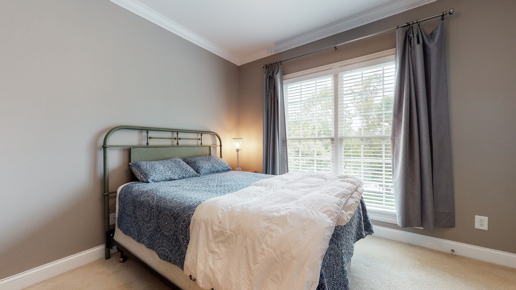 665 Springlake Drive Franklin, TN 37064 - Photo 27 of 41 a bedroom with a bed and a window