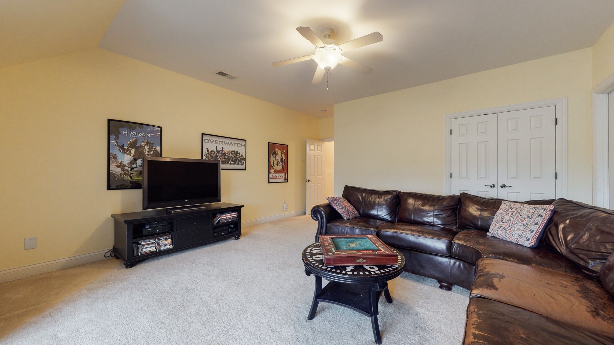 665 Springlake Drive Franklin, TN 37064 - Photo 30 of 41 a living room with furniture and a flat screen tv