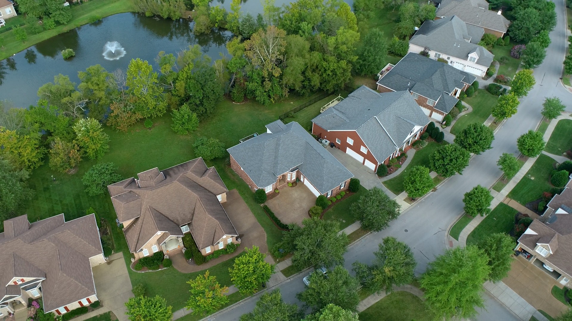 665 Springlake Drive Franklin, TN 37064 - Photo 4 of 41 an aerial view of a house with outdoor space and lake view