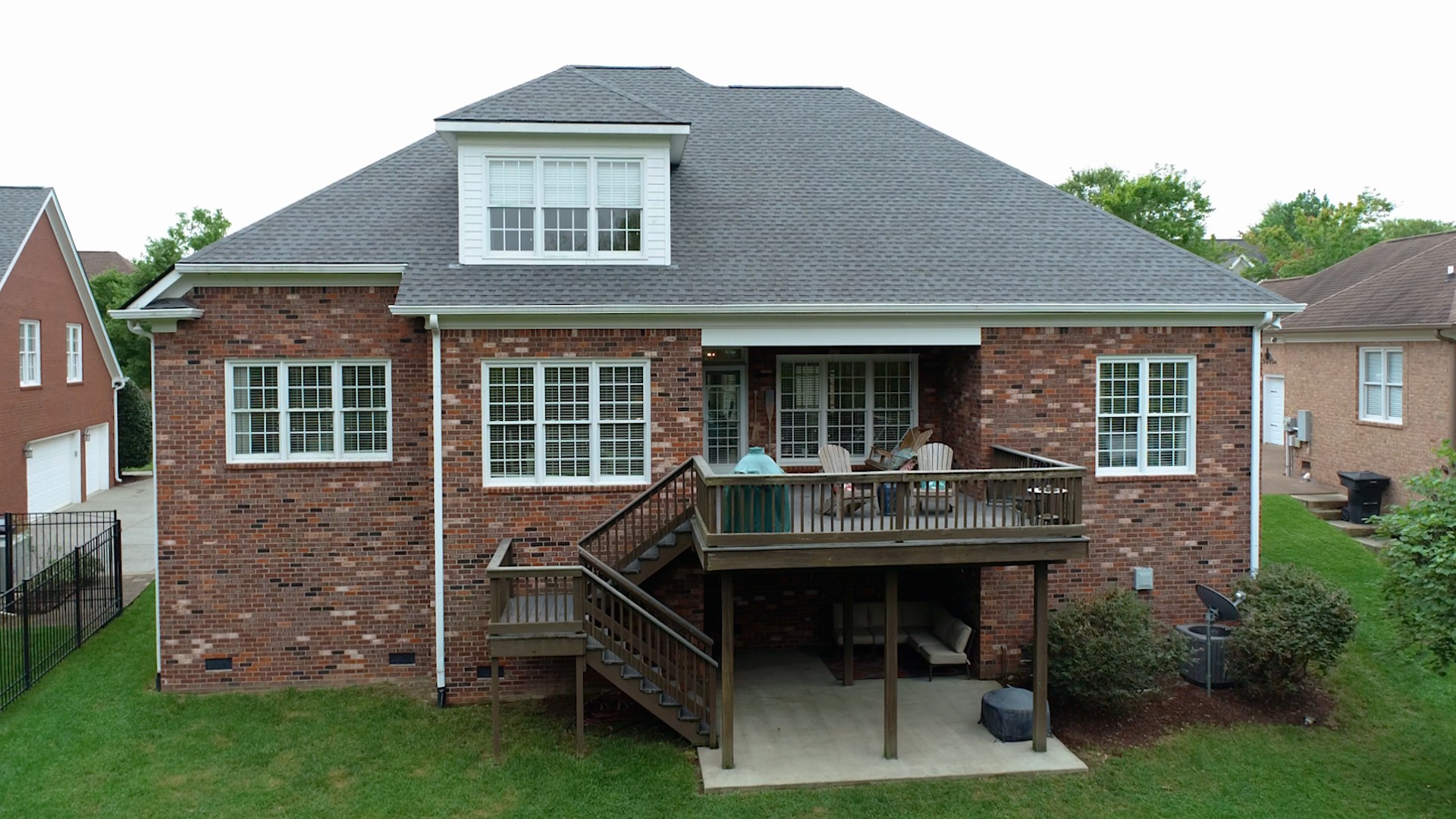 665 Springlake Drive Franklin, TN 37064 - Photo 6 of 41 a view of a house with a backyard and sitting area