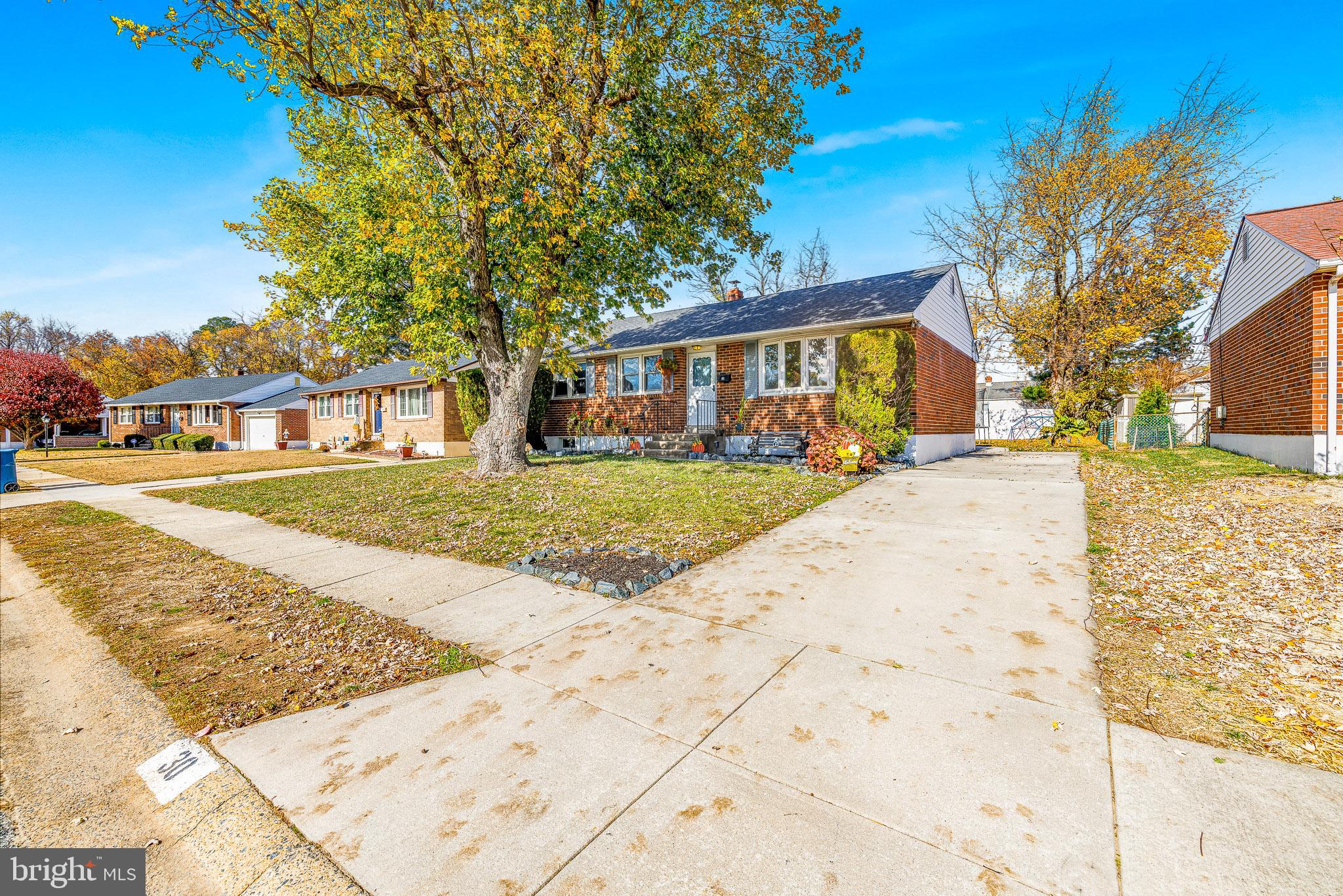 30 Tuckahoe Road New Castle, DE 19720 - Photo 29 of 40 Charming brick home with vibrant autumn hues.