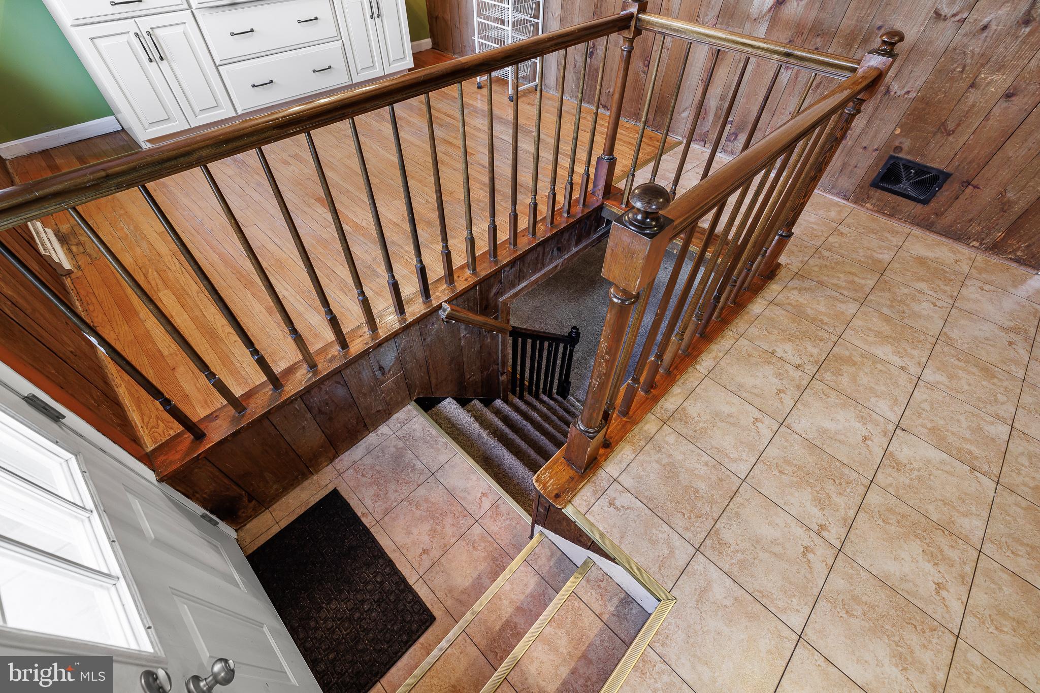 30 Tuckahoe Road New Castle, DE 19720 - Photo 8 of 40 Inviting staircase with warm wooden accents.