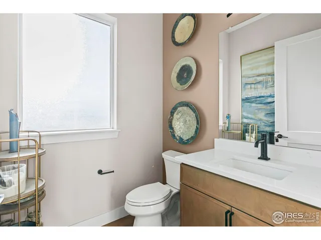 a kitchen with stainless steel appliances a stove microwave and cabinets