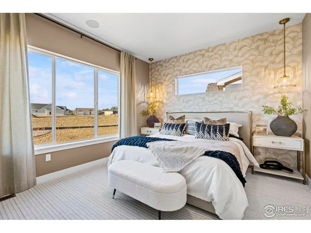 a bathroom with a toilet a sink and a mirror