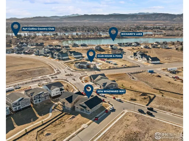 a front view of a house with garden and sitting area