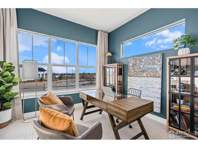 a view of a hallway with washer and dryer