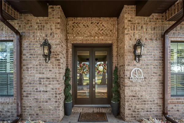 a view of a patio with table and chairs with wooden floor