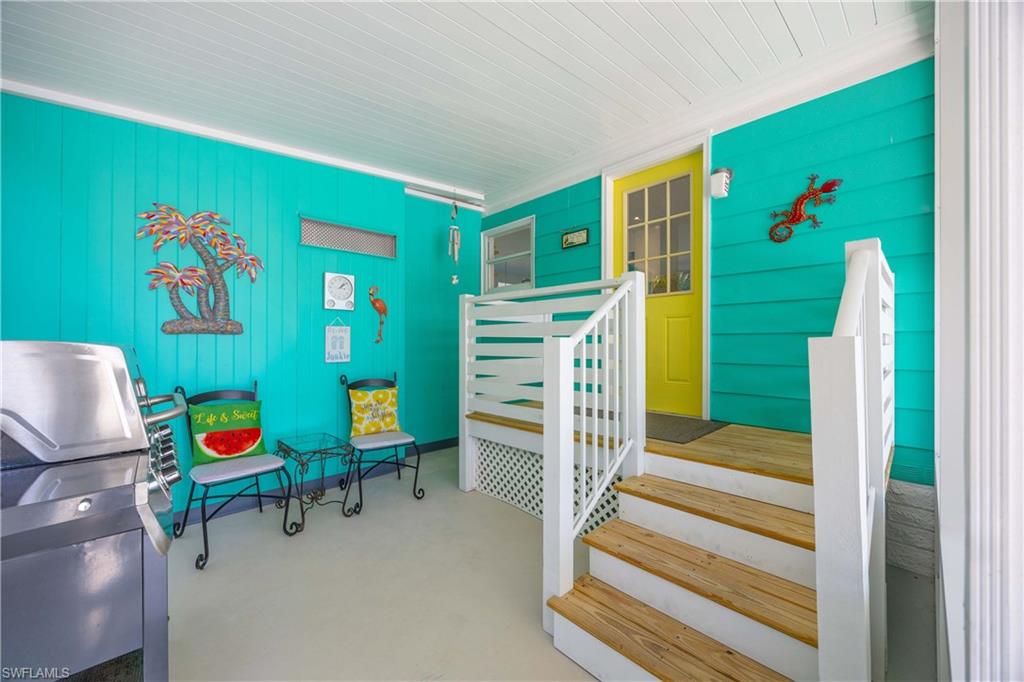 216 Rookery Road Naples, FL 34114 - Photo 3 of 44 a room with toys and a large window